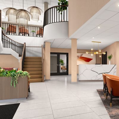 Bright and welcoming lobby with seating and stairs