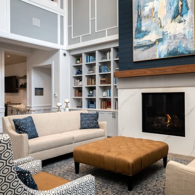 Cozy common area with seating and a fireplace