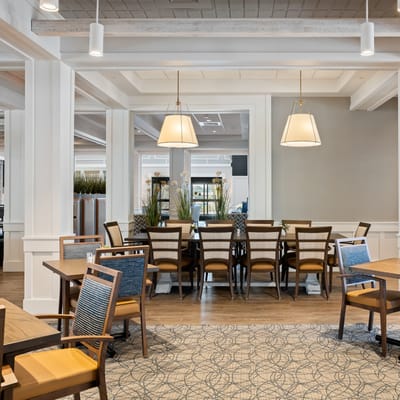 Bright dining room with tables and chairs