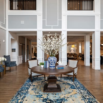 Bright and welcoming common area with floral decor