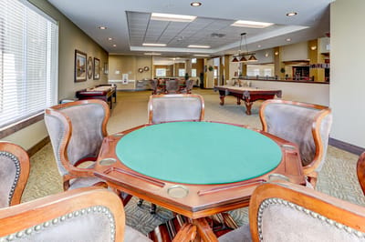 Interior view of a common area with a gaming table