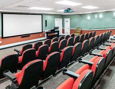 Interior view of a movie theater in a senior living facility