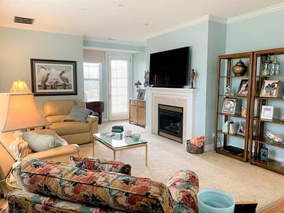 Bright and cozy living room area in a senior facility