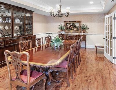 Elegant dining room with a large wooden table