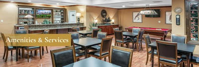Interior common area with tables and a pool table