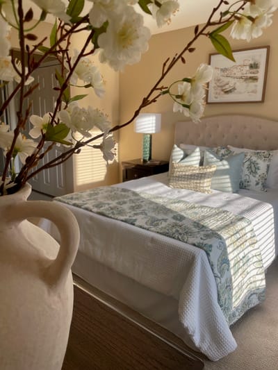 Cozy interior view of a well-decorated bedroom