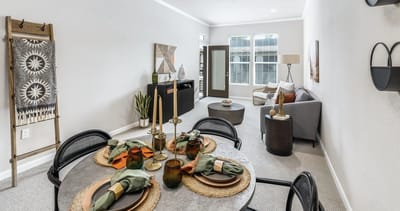 Bright interior living space with dining area