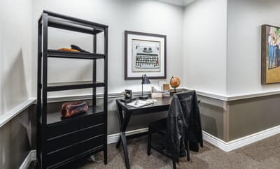 Modern interior office space with desk and decor