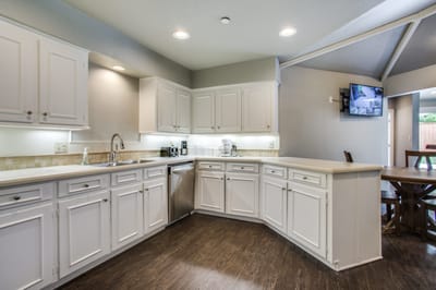 Bright kitchen area with modern cabinetry