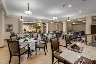 Dining area set for a meal with elegant decor