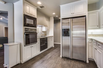 Bright, modern kitchen interior with appliances