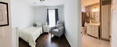 Bright, comfortable resident room with a private bathroom