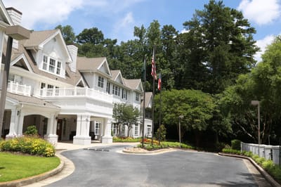 Exterior view of PruittPlace Buckhead with landscaping