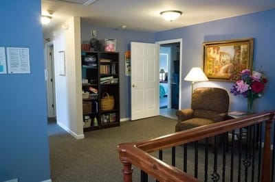 Interior view of a cozy common area with art