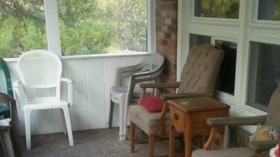 Seating area on a screened porch