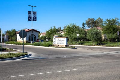 Exterior sign of The Vineyards assisted living facility