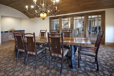 Dining room with a large wooden table and chairs