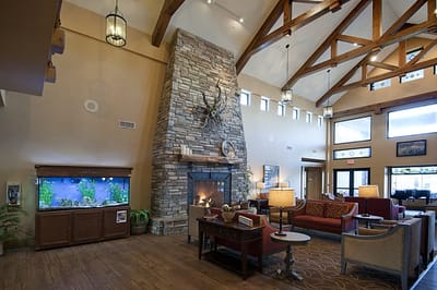 Interior of a cozy lobby with fireplace and seating