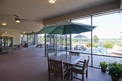 Covered outdoor area with tables and seating