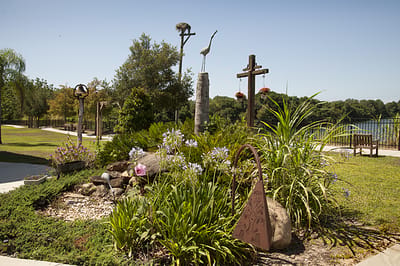 Beautiful outdoor space with greenery and sculptures