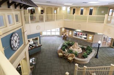 Interior view of a spacious common area with a fountain
