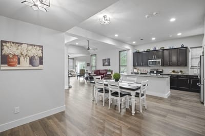 Bright interior of a dining area with a kitchen