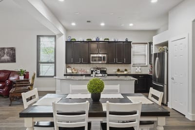 Bright interior of a common area with a dining table