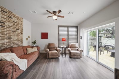 Bright common area with comfortable seating and outdoor access