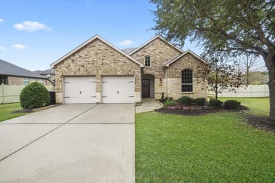 Exterior view of a brick building with a driveway