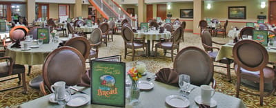 Dining room with set tables and chairs