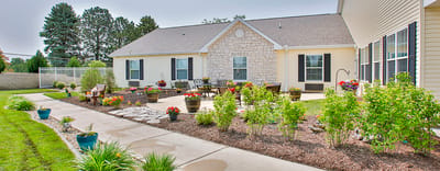 Serene garden area with seating and flowers