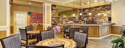 Interior dining area with tables and a counter