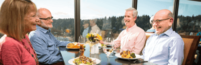 Residents enjoying lunch in a bright dining room