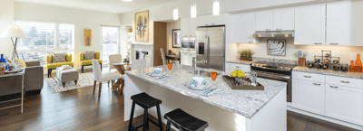 Bright interior kitchen and living area in a senior facility