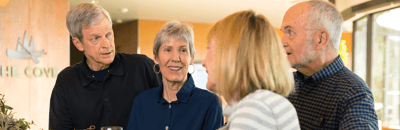 Residents engaging in conversation in a common area