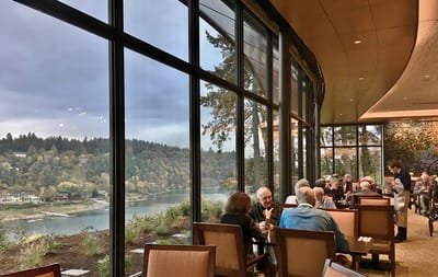 Residents enjoying a meal with a scenic view