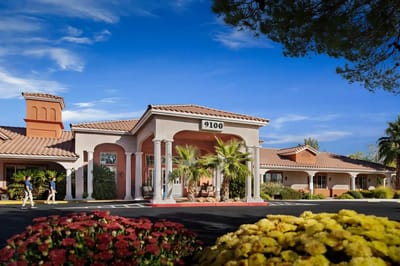 Exterior view of Aegis Living Moraga with flowers