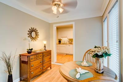 Cozy dining area with wooden furniture and decor