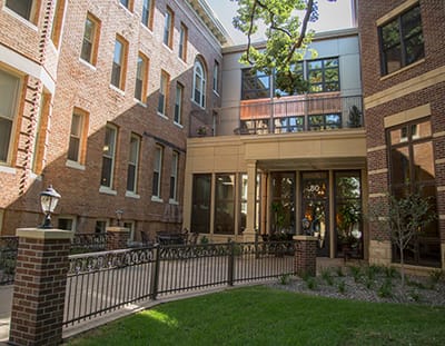 Outdoor courtyard area of the facility with greenery