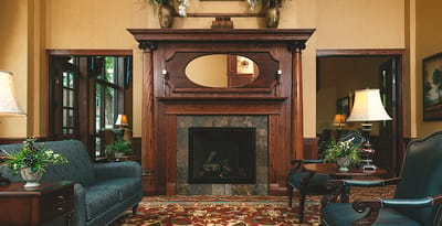 Cozy lounge area with fireplace and seating