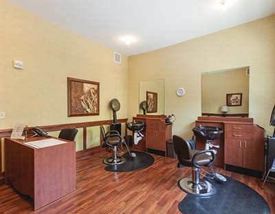 Hair salon area with styling stations