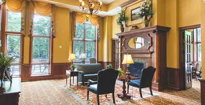 Bright and inviting common area with seating and large windows