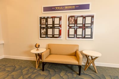 Interior common area featuring a Wall of Honor display