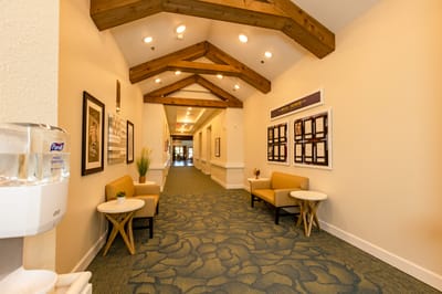 Bright interior hallway with seating areas