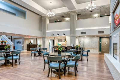 Bright interior common area with tables and chairs