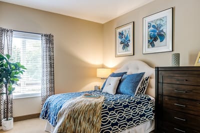 Cozy resident room with bed and decor