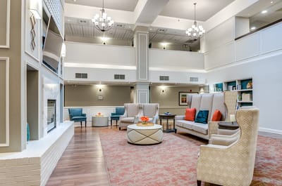 Common area with seating and decorative lighting