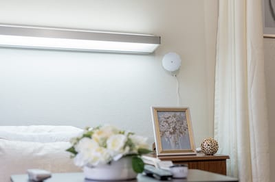 Cozy private resident room with decor and flowers