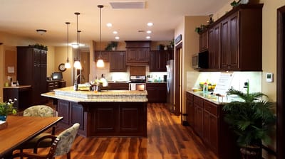 Bright kitchen area with wooden cabinets and island