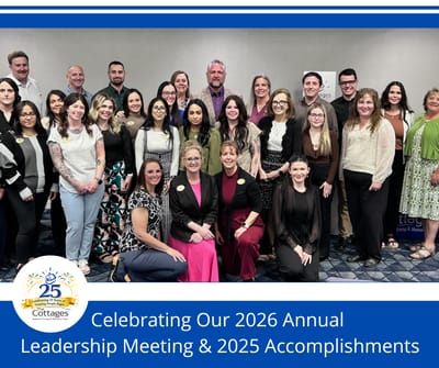 Group photo of staff celebrating accomplishments.
